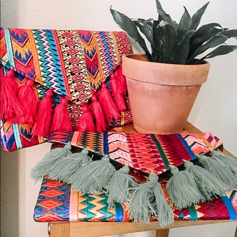 Hand embroidered clutches